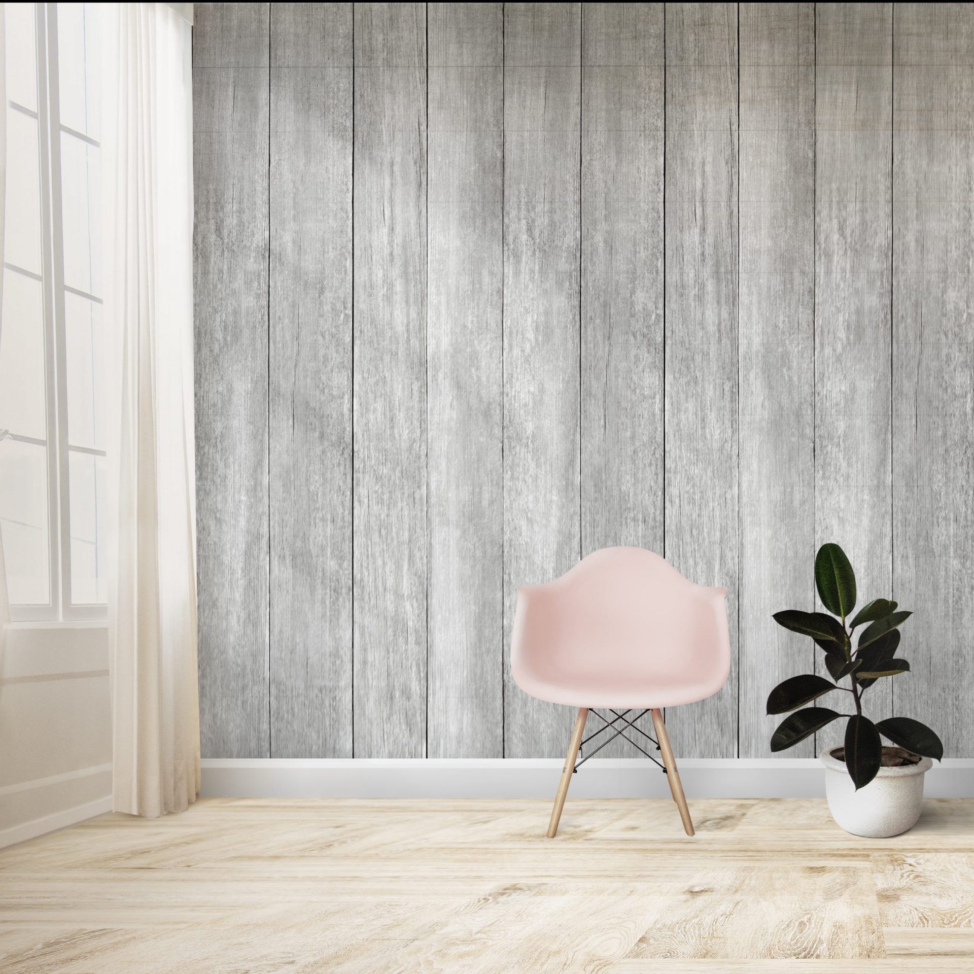 Pink chair and a plant against a wall mockup